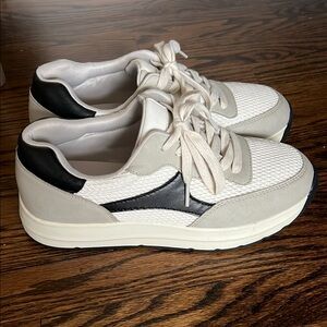 Stylish White and Black Sneakers